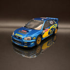 Subaru Impreza WRC S9 – Rally de Gran Bretaña 2003 #7 Petter Solberg Escala 1:12 de OTTOmobile
