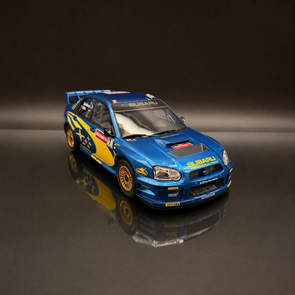 Subaru Impreza WRC S9 – Rally de Gran Bretaña 2003 #7 Petter Solberg Escala 1:12 de OTTOmobile