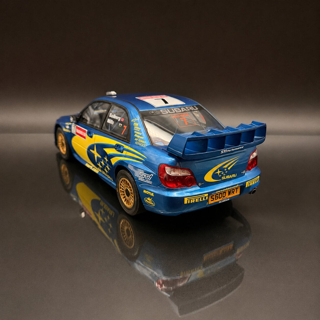 Subaru Impreza WRC S9 – Rally de Gran Bretaña 2003 #7 Petter Solberg Escala 1:12 de OTTOmobile