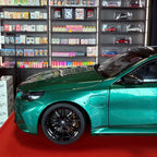 BMW M5 Touring 2024 Green Metallic 1:18 Scale by Minichamps