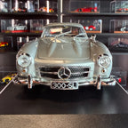 Mercedes-Benz 300 SL 1955 stříbrný v měřítku 1:18 od Minichamps