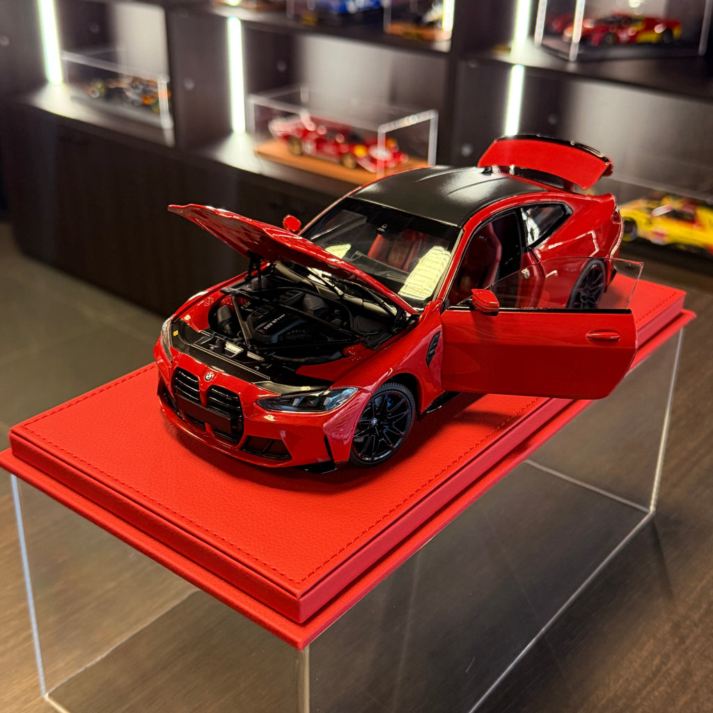 BMW M4 2024 v metalicky červené barvě v měřítku 1:18 od Minichamps