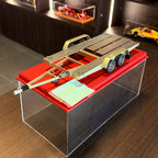 Strieborný príves na prepravu vozidiel z roku 1980 1:18 od spoločnosti OttOmobile