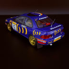 Subaru Impreza 555 Rallye Monte Carlo 1995, vůz č. 5, Carlos Sainz, měřítko 1:18 s vitrínou od Kyosho