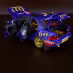 Subaru Impreza 555 Rallye Monte Carlo 1995, vůz č. 5, Carlos Sainz, měřítko 1:18 s vitrínou od Kyosho