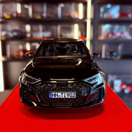 Audi RS 3 Sportback 2025 negru Myth metalizat 1:18 de Norev