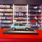 Volkswagen Golf II 4dveřový 1985 stříbrná metalická zelená 1:43 od Maxichamps