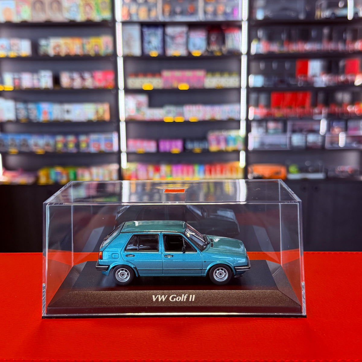 Volkswagen Golf II 4-dørs 1985 turkis metallic 1:43 fra Maxichamps