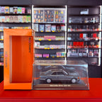 Mercedes-Benz 560 SEC (C126) 1986 šedá metalíza 1:43 od Maxichamps