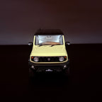 Suzuki Jimny Sierra JB74 – Chiffon Ivory Metallic / Black Roof im Maßstab 1:18 von AUTOart