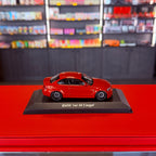 BMW 1. řady M Coupé (E82) 2011 oranžová metalíza 1:43 od Maxichamps