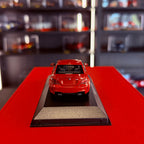 BMW 1. řady M Coupé (E82) 2011 oranžová metalíza 1:43 od Maxichamps
