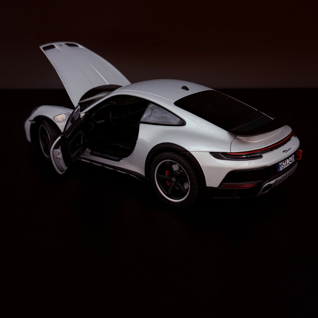 Modellauto Norev 1/18 Porsche 911 Dakar 2023 Ice Grey Metallic
