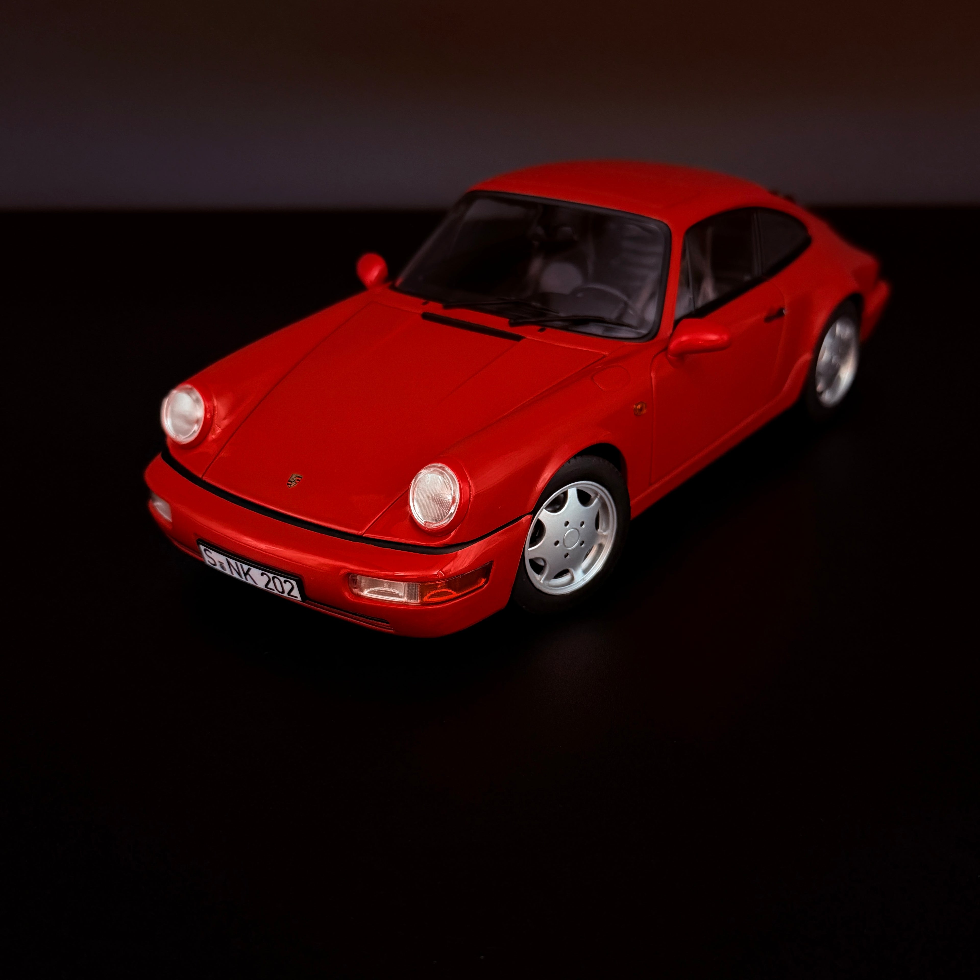 Porsche 911 (964) Carrera 2 Coupé (1990), Maßstab 1:18, Norev