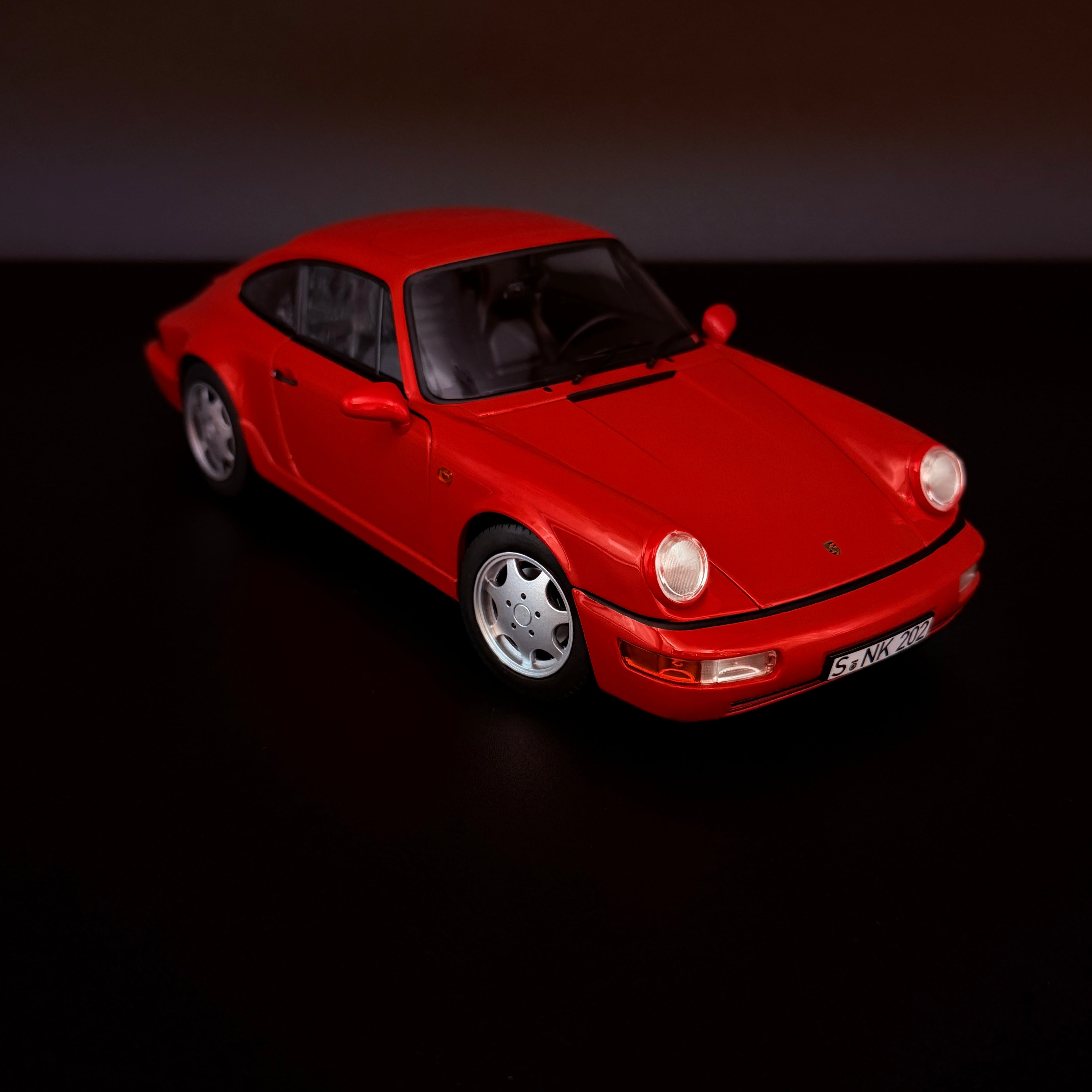 Porsche 911 (964) Carrera 2 Coupé (1990), Maßstab 1:18, Norev