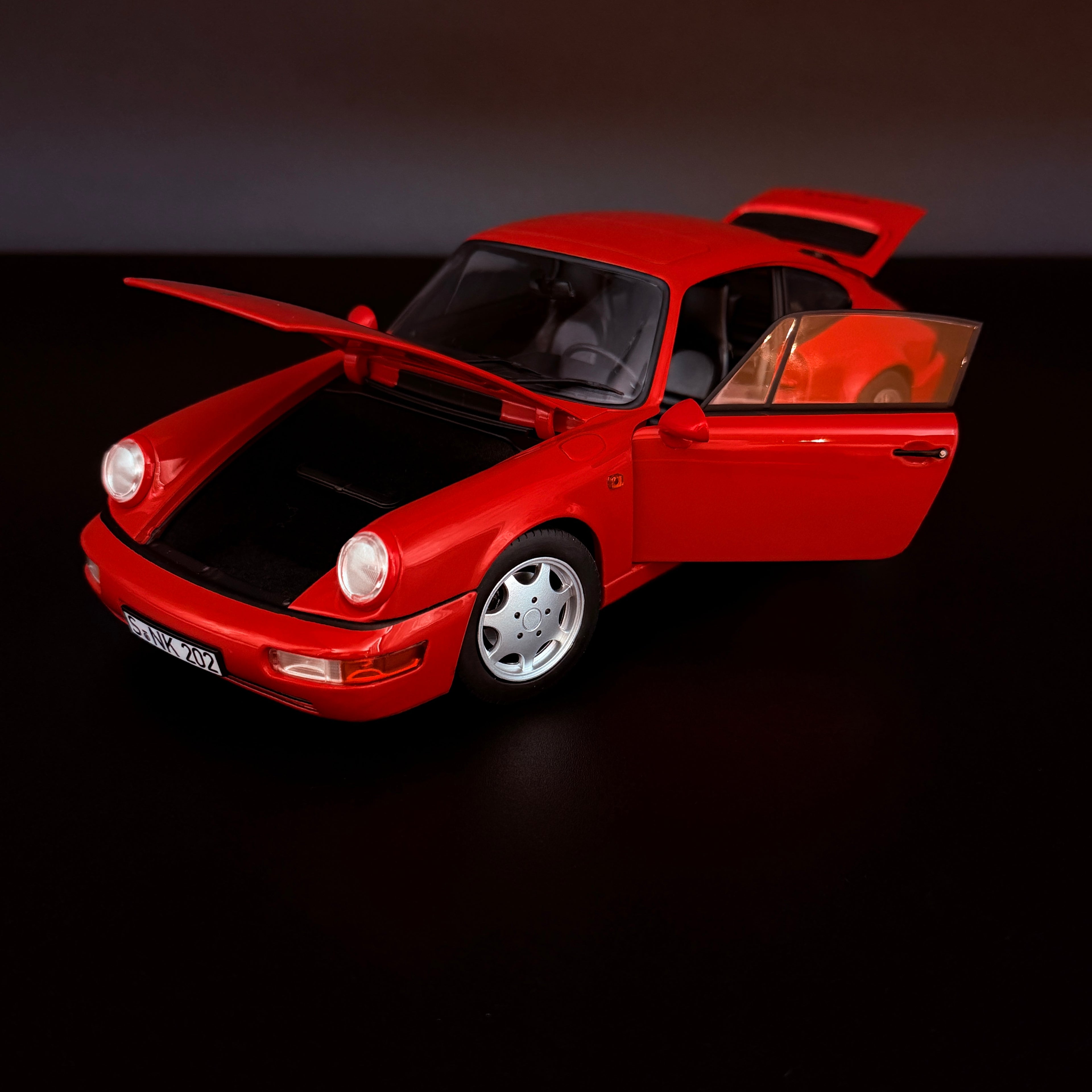 Porsche 911 (964) Carrera 2 Coupé (1990), Maßstab 1:18, Norev