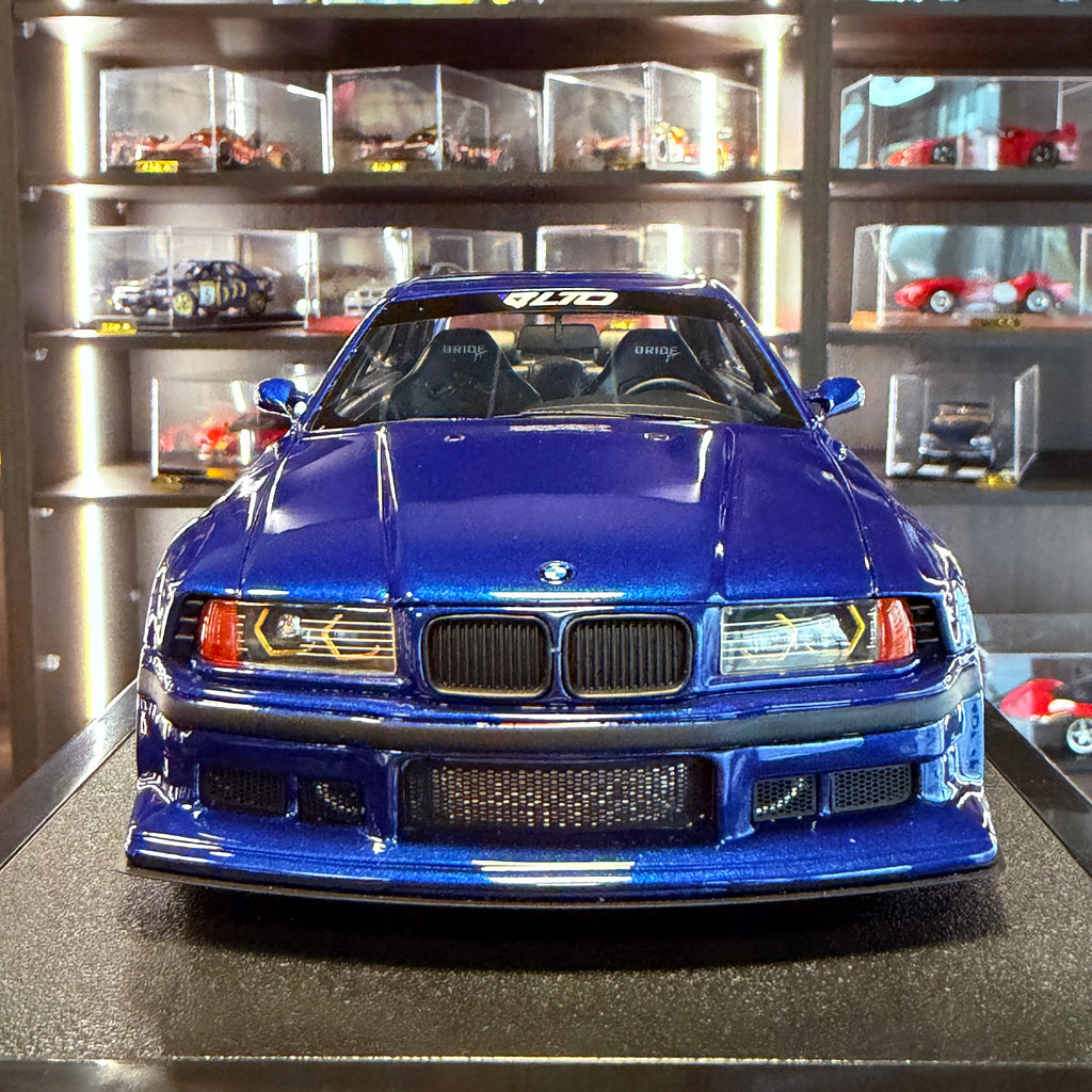 BMW E36 LTO Sedan Turbo od Khyzyla Saleema Avus Blue 2023 – 1:18 OttOmobile