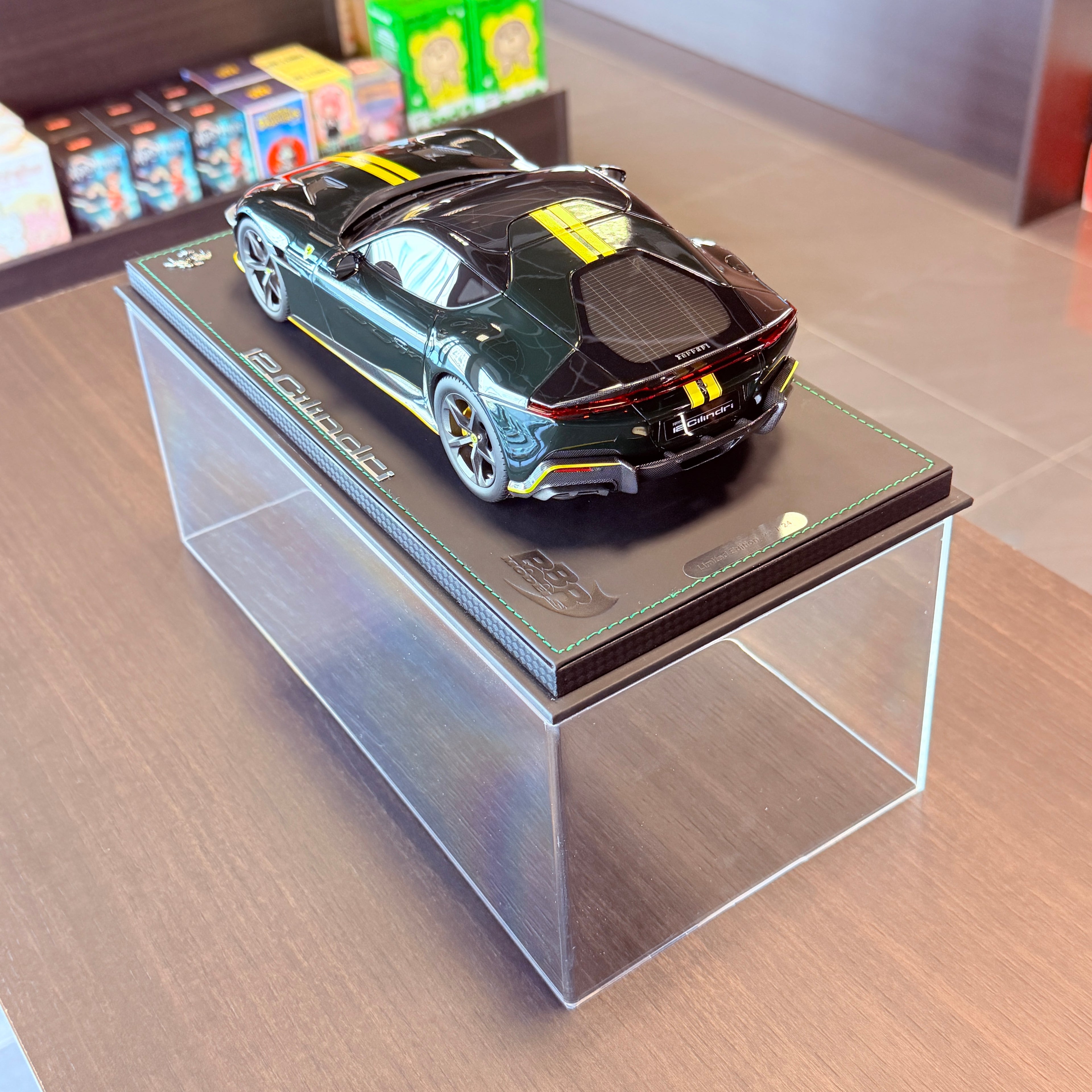 Ferrari 12Cilindri Panoramic Roof Verde British with Yellow Stripes Limited Edition 1:18 Scale with Display Case by BBR Models