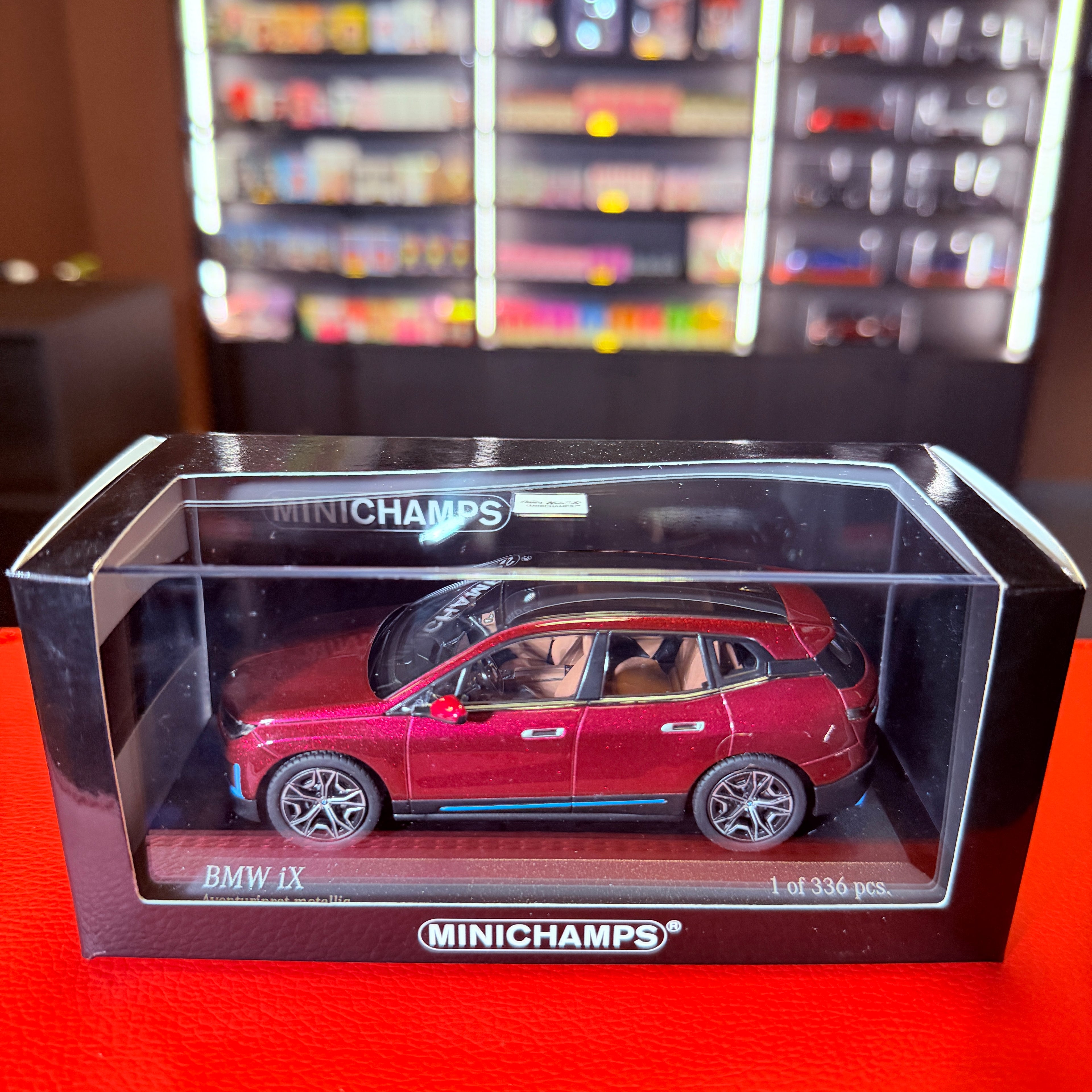 BMW iX 2022 Red Metallic – 1:43 Scale Model Car by MINICHAMPS