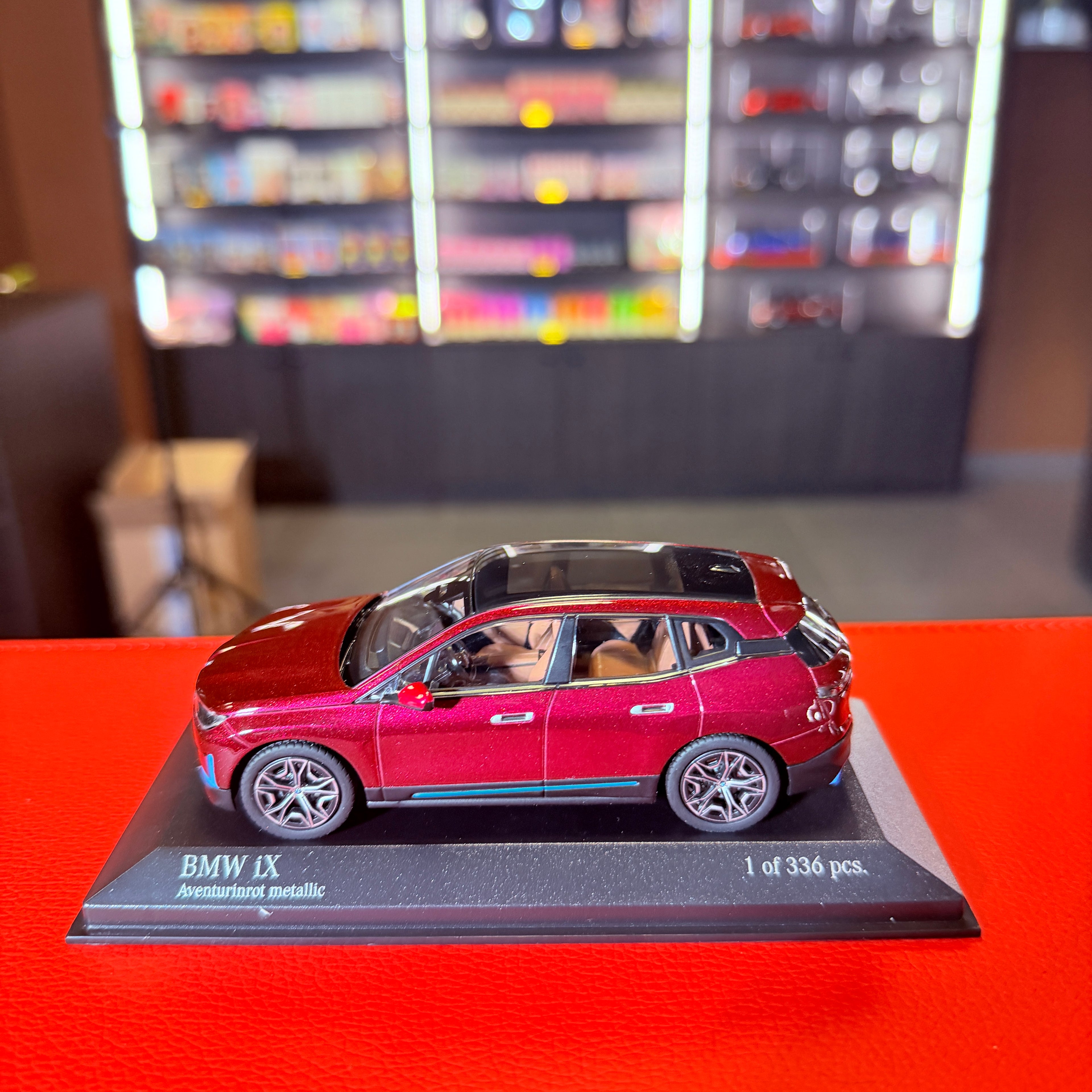 BMW iX 2022 Red Metallic – 1:43 Scale Model Car by MINICHAMPS