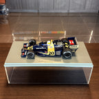 Wolf WR1, vítěz Velké ceny Monaka 1977, Jody Scheckter, měřítko 1:18 s vitrínou od Spark Models