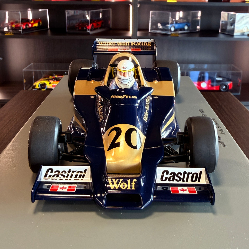Wolf WR1, vítěz Velké ceny Monaka 1977, Jody Scheckter, měřítko 1:18 s vitrínou od Spark Models