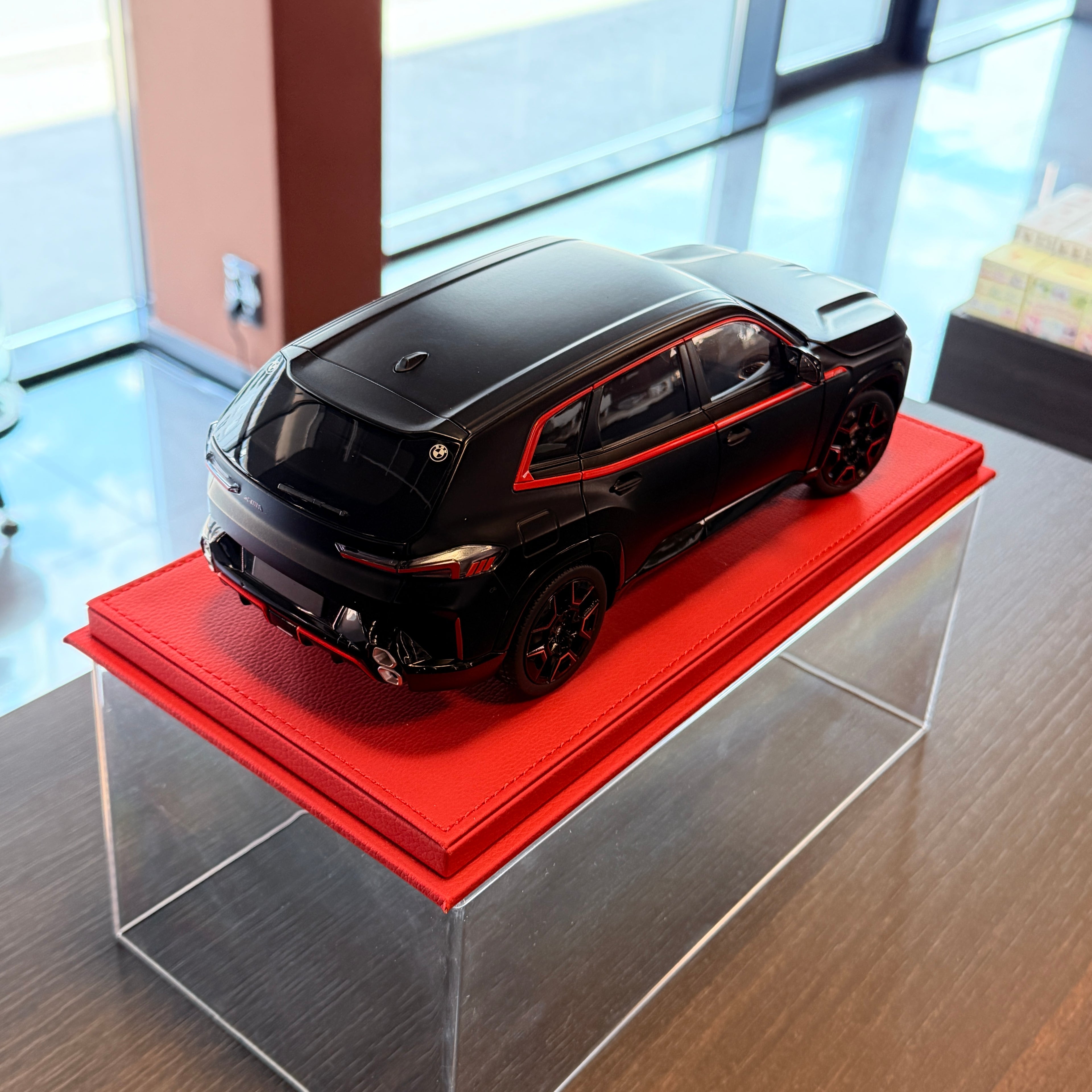 BMW XM 2023 Matt Black 1:18 Scale with Display Case by Minichamps