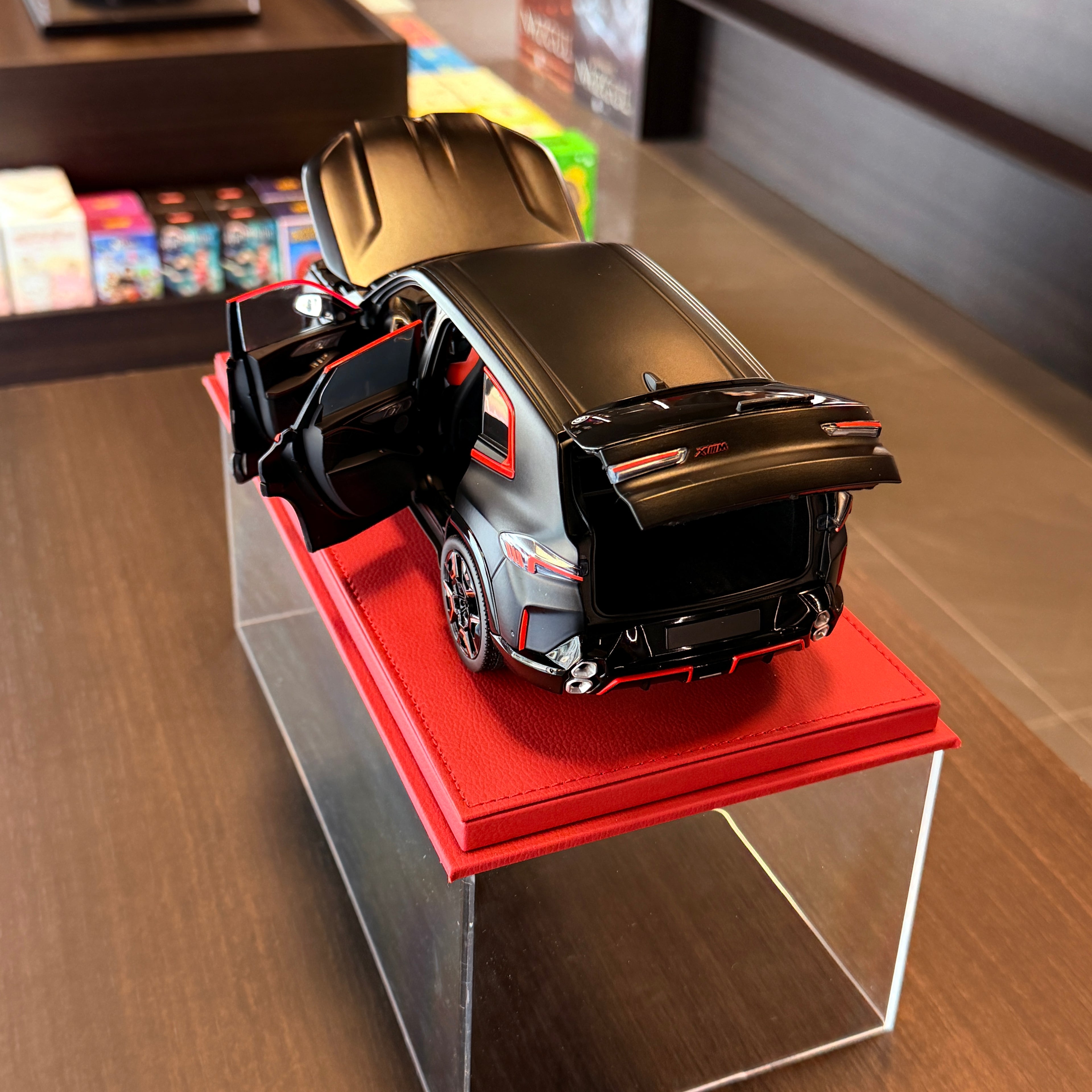 BMW XM 2023 Matt Black 1:18 Scale with Display Case by Minichamps