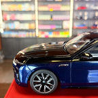 BMW i7 M70 2023 Blue Metallic / Black Metallic 1:18 Scale with Display Case by Minichamps