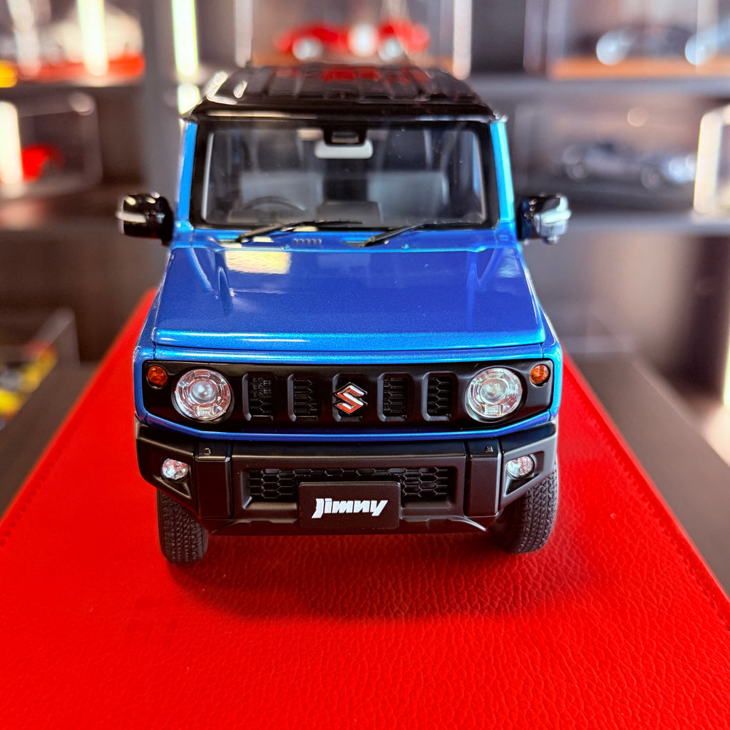 AUTOart Suzuki Jimny JB64 1:18 Brisk Blue Metallic Black Roof front view