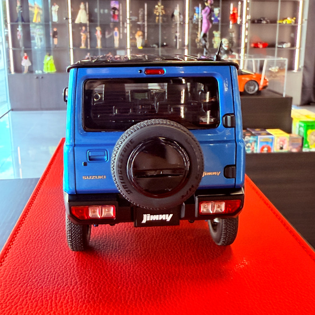 AUTOart Suzuki Jimny JB64 1:18 Brisk Blue Metallic Black Roof side view