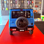 AUTOart Suzuki Jimny JB64 1:18 Brisk Blue Metallic Black Roof side view