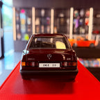 AUTOart Mercedes-Benz 190 E 2.0 W201 1:18 Barolo Red front three-quarter view