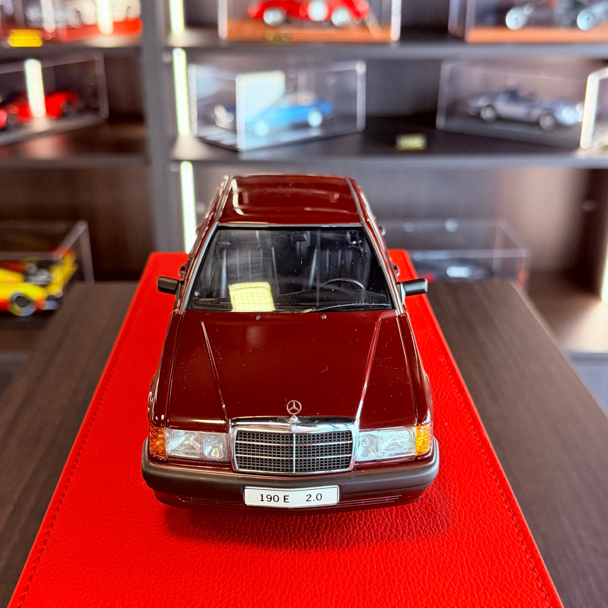 AUTOart Mercedes-Benz 190 E 2.0 W201 1:18 Barolo Red elevated view