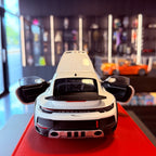 Minichamps Porsche 911 Dakar 2022 1:18 White front three-quarter view