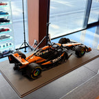 Tím McLaren Formula 1 MCL38 č. 81, víťaz Veľkej ceny Maďarska 2024, Oscar Piastri, mierka 1:12 od Spark