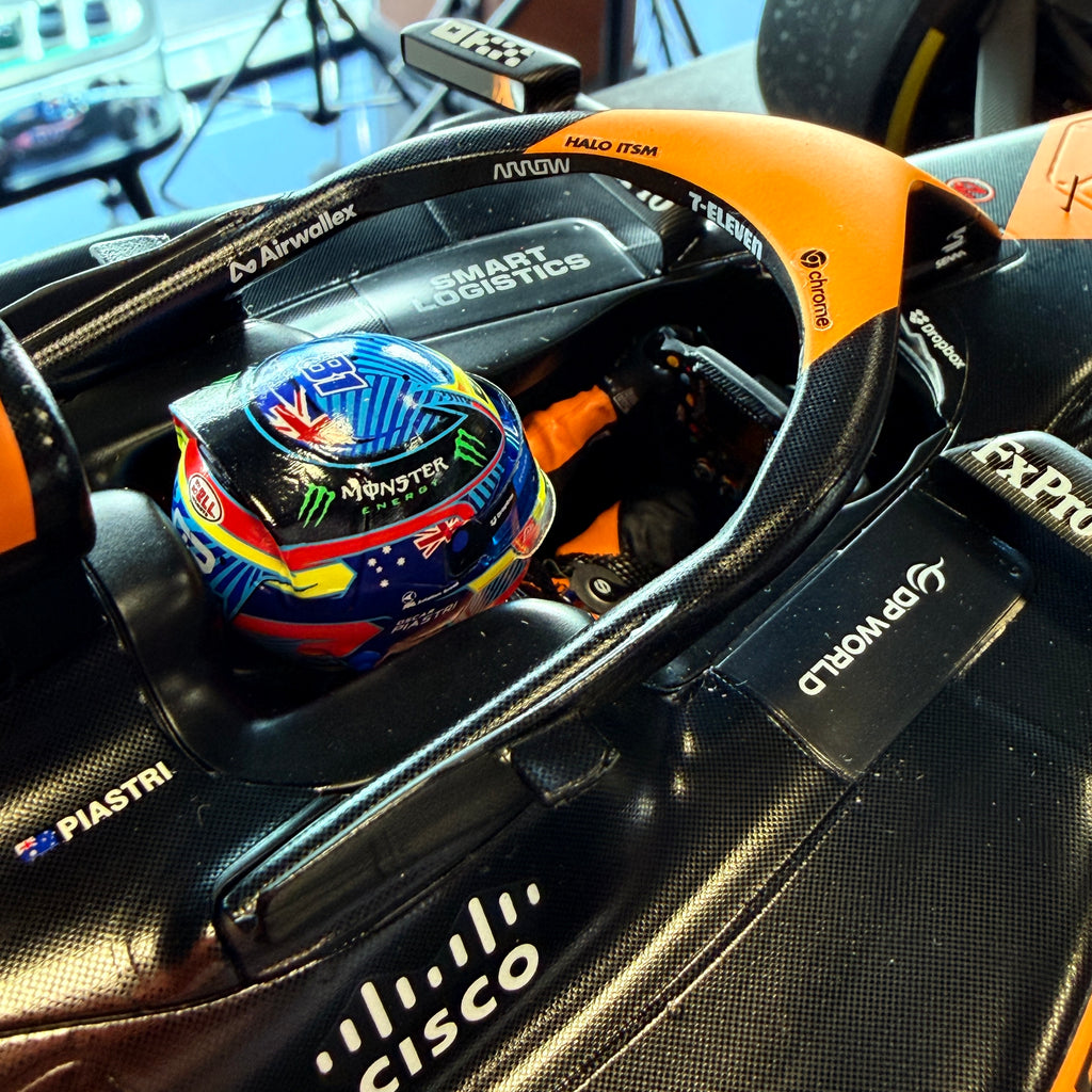 Tím McLaren Formula 1 MCL38 č. 81, víťaz Veľkej ceny Maďarska 2024, Oscar Piastri, mierka 1:12 od Spark