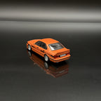 BMW Alpina B10 Bi-Turbo (E34) 1994 – Orange im Maßstab 1:43 von Solido