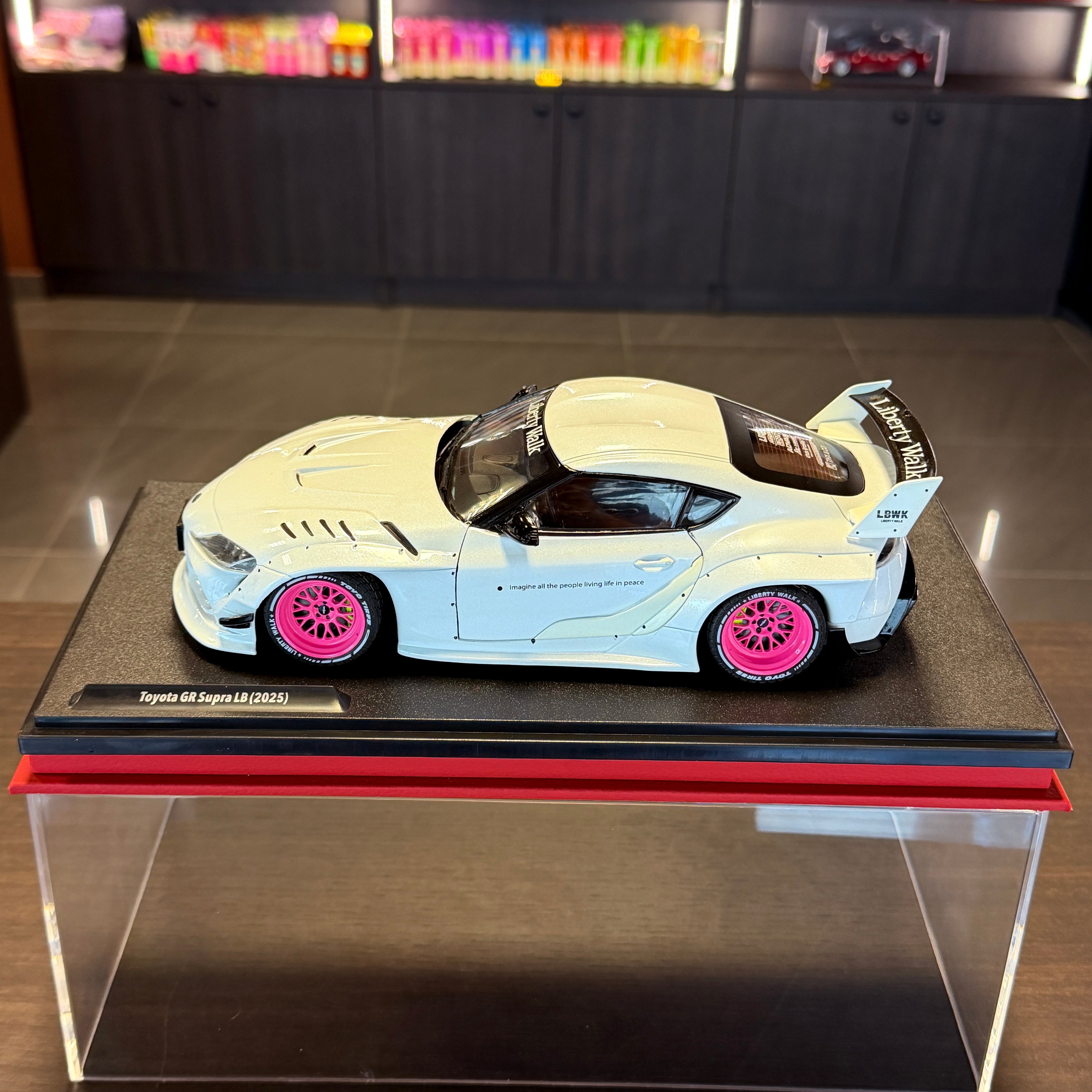 Toyota GR Supra Liberty Walk Body Kit White/Pink 2025 1:18 od Solido