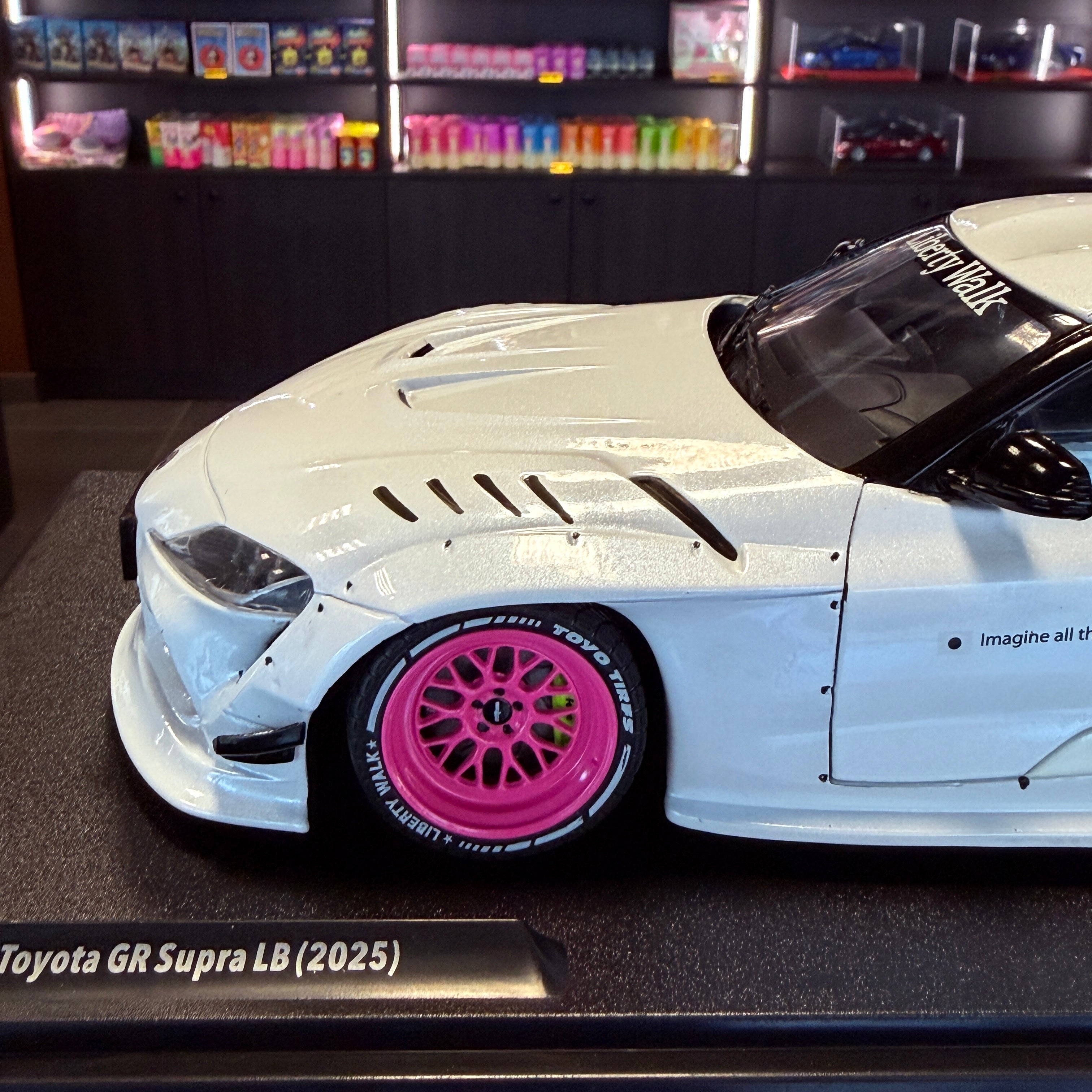 Toyota GR Supra Liberty Walk Body Kit White/Pink 2025 1:18 od Solido