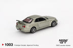 Nissan Skyline GT-R (R34) V-Spec II Nür Millennium Jade 1:64 Diecast-Modell